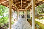 Covered walkway from house to screened porch